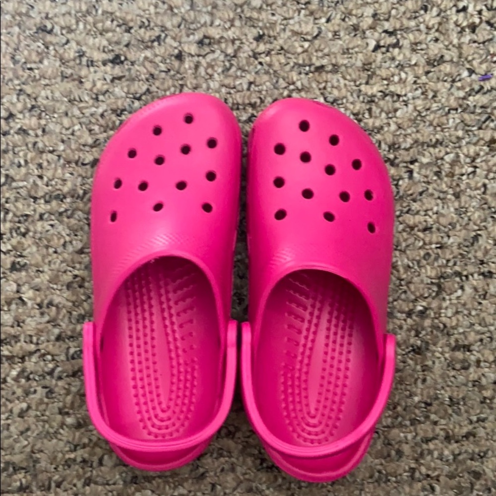 Pink crocs
